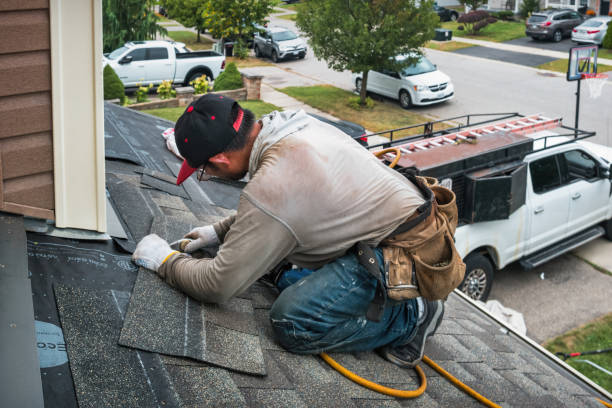 Professional Roofing technician working in Candor, NY